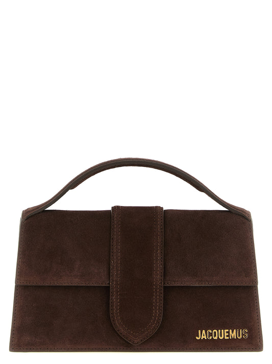 Flap Handbag by Jacquemus for women in bos taurus suede calfskin leather brown, gold & signature features an refined silhouette, showcasing a secure flap & magnetic, ample , and versatile shoulder-strap & handle for a sophisticated refined aesthetic.