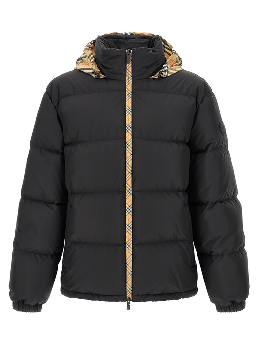 This Hooded Parka by Burberry for men in plush polyester & goose down black presents a enveloping silhouette, meticulously detailed with hooded & insulated and a enveloping hooded neckline.