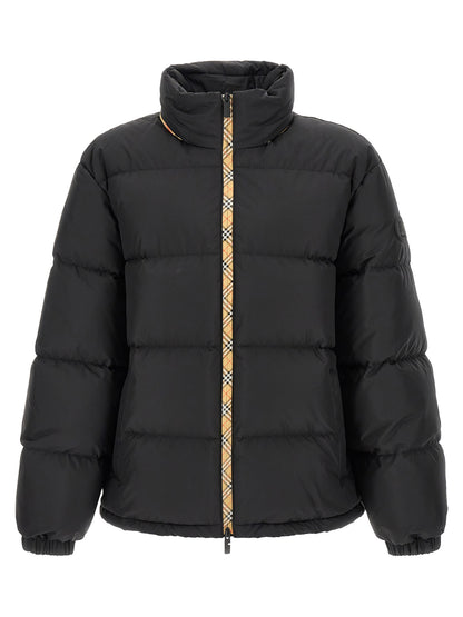 This Hooded Parka by Burberry for men in plush polyester & goose down black presents a utilitarian silhouette, meticulously detailed with hooded & insulated and a utilitarian hooded neckline for a sophisticated, weather-ready look.