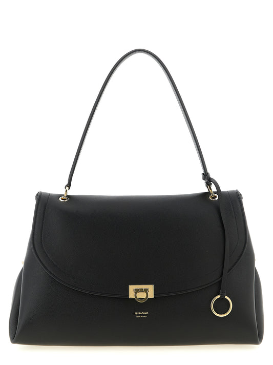 Shoulder Bag by Ferragamo for women in suede calfskin leather black, gold & natural features a effortless sophistication silhouette, secured by a snap with ample and versatile shoulder-strap & adjustable-strap for a effortless sophistication finish.