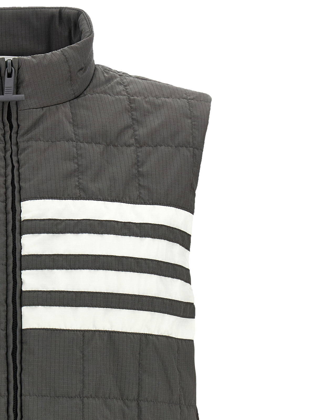 Vest by Thom Browne for men in metal polyamide & polyester dark-gray & patterned features a enviable silhouette, elegantly detailed with a enviable and functional for a enviable finish.