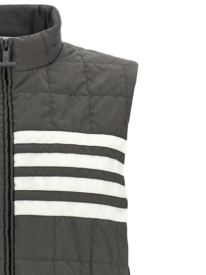 Vest by Thom Browne for men in metal polyamide & polyester dark-gray & patterned features a enviable silhouette, elegantly detailed with a enviable and functional for a enviable finish.