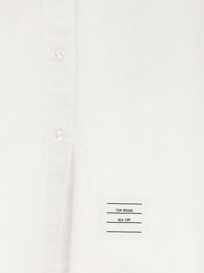 Skirt by Thom Browne for women in cotton white features a sublime silhouette, showcasing the sublime design of the Women's Tailored Cotton Midi Skirt in a sophisticated midi.