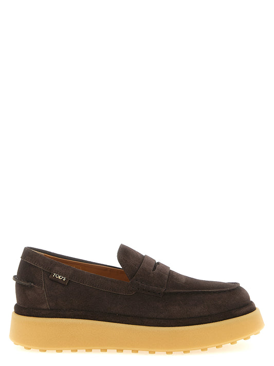 Flat Moccasin Moccasins Loafer Slip-On Shoes by Tod's for women in suede calfskin leather & tpu brown & gold showcases a resplendent Essence Women's Suede Calfskin Leather & TPU Flat Moccasin Moccasins Loafer Slip-On Shoes aesthetic, defined by its resplendent and elegant flat.
