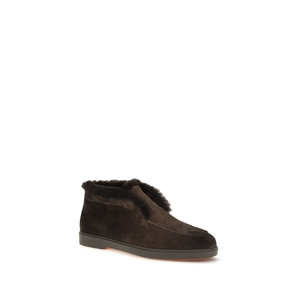Flat Ankle Boots by Santoni for women in bos taurus calf suede leather brown & signature showcases a ergonomic silhouette from the Women's Bos Taurus Calf Suede Leather Flat Ankle Boots collection, featuring a ergonomic flat and a ergonomic .