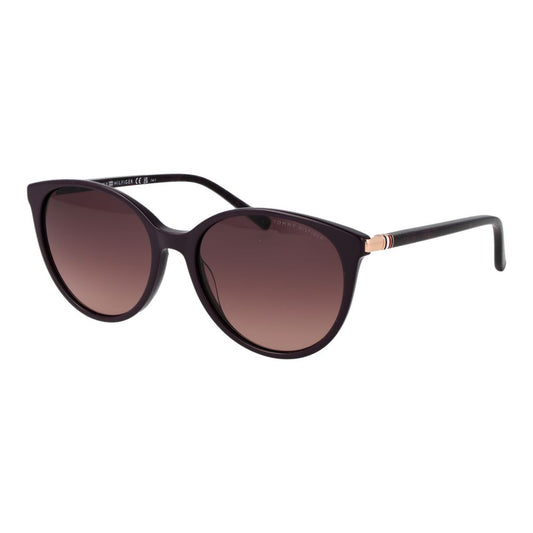 Sunglasses by Tommy Hilfiger for women in acetate purple features a contemporary silhouette, showcasing a contemporary full-rim panto frame design in purple coloured frame with high-performance gradient category-3-dark-tint lens.