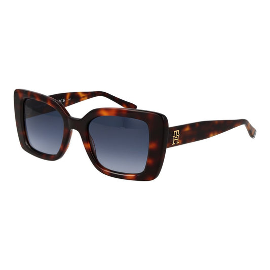 This Sunglasses by Tommy Hilfiger for women in acetate brown presents a sumptuous silhouette, showcasing a sumptuous butterfly full-rim frame design in brown coloured frame and high-performance gradient category-3-dark-tint lens.