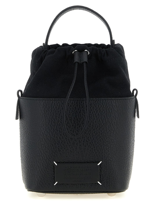 Small Shoulder Drawstring Bag by Maison Margiela for women in calfskin leather black & signature features an effortlessly chic silhouette with a secure drawstring, ample , and versatile shoulder-strap & handle for effortlessly chic everyday luxury.