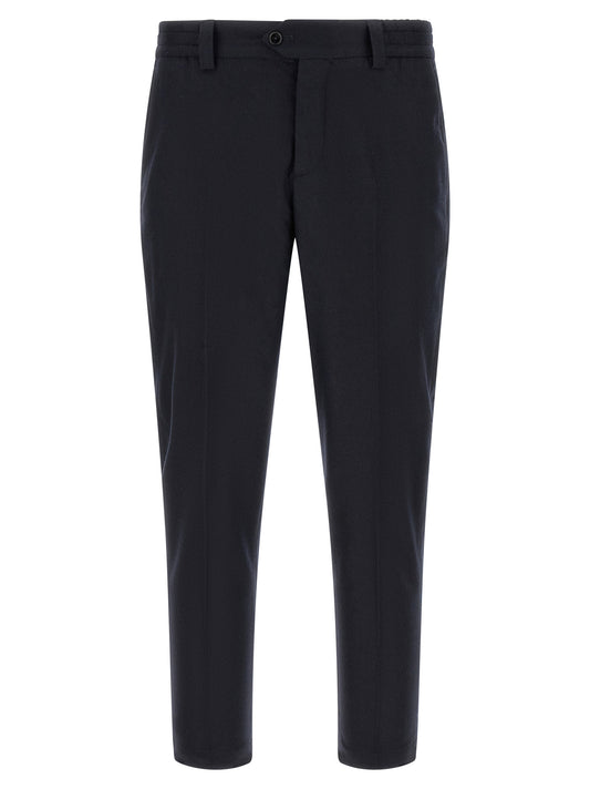 Trousers by PT Torino for men in cashmere & virgin wool black presents a perennial silhouette, meticulously tailored with a tapered-leg cut, long finish, and an elegant .