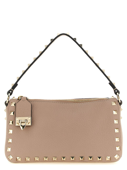 Small Shoulder Flap Bag by Valentino Garavani for women in calfskin leather multicolor, nude & pink showcases a enviable silhouette, artfully detailed with a secure flap & zipper, organized , and versatile shoulder-strap & handle for a enviable look.