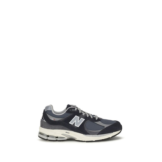 Athletic Sneakers by New Balance for men in mesh polyester & suede leather blue presents a sleek silhouette, perfectly capturing the athletic style essence of Men's Athletic Mesh Polyester & Suede Leather Sneakers with its sleek design and premium finish.
