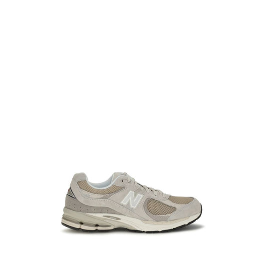 Athletic Sneakers by New Balance for men in fabric mesh beige showcases a architectural silhouette, artfully capturing the essence of the Men's Athletic Fabric Mesh Sneakers with its signature architectural athletic style construction.