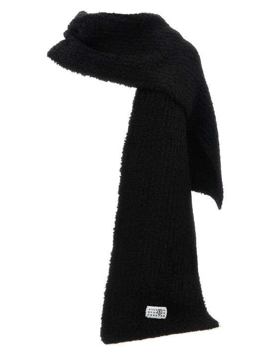 Scarf by MM6 Maison Margiela for women in viscose polyamide marabou & wool black & signature presents a cosy silhouette, artfully capturing the sophisticated design and premium aesthetic of the Viscose Polyamide Marabou & Wool Shawl Scarf.