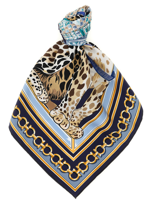 Scarf by Ferragamo for women in canvas & silk gold & navy presents a effortlessly chic silhouette, artfully capturing the essence of the effortlessly chic Gancini Canvas & Silk Foulard Scarf design for a sophisticated look.