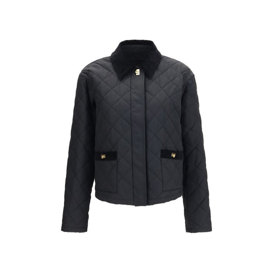 Overcoat by Ferragamo for women in polyamide cotton corduroy black features a cosy chic silhouette, artfully detailed with a sophisticated and premium pockets & insulated for a cosy chic finish.