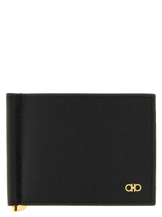 Cardholder Wallet by Ferragamo for men in calfskin leather black & gold showcases a polished silhouette, artfully capturing the essence of the Gancini Calfskin Leather Cardholder Wallet with its polished design and functional card-organization.