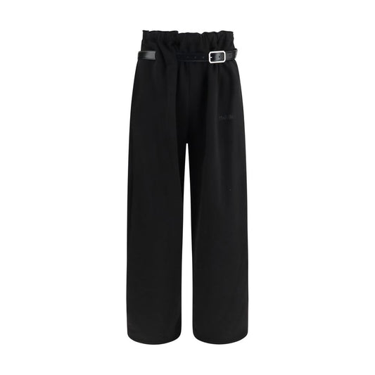Casual Pants by Magliano for men in cotton black features an refined tailoring silhouette, showcasing a premium straight-leg, relaxed-fit, regular-fit & wide with a high rise and long cut for a refined tailoring look.
