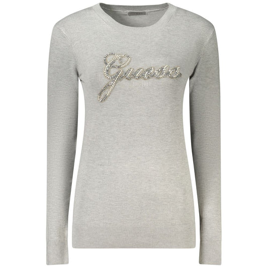 Sweatshirt by Guess Jeans for women in viscose & rhinestone gray features an provocated silhouette, detailed with a provocated and a refined crew neckline for a sophisticated aesthetic.