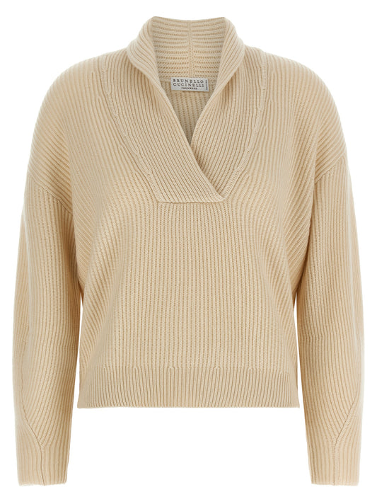 Cardigan by Brunello Cucinelli for women in cashmere beige showcases a captivating silhouette, artfully detailed with a captivating and wrap v-neck shawl-collar neckline for a truly sophisticated captivating look.