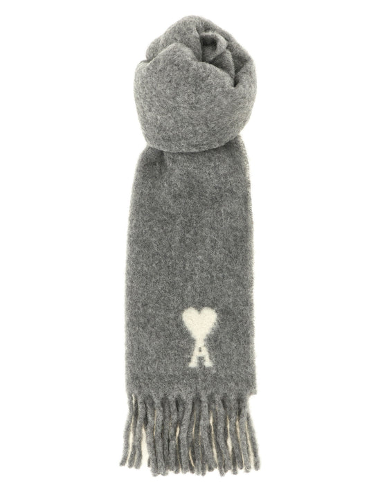 Scarf by Ami Paris for unisex in leather polyamide & alpaca wool gray, jacquard & signature features a timeless silhouette, artfully capturing the essence of the timeless Essence Leather Polyamide & Alpaca Wool Foulard Wrap Fringes Scarf design for a sophisticated look.