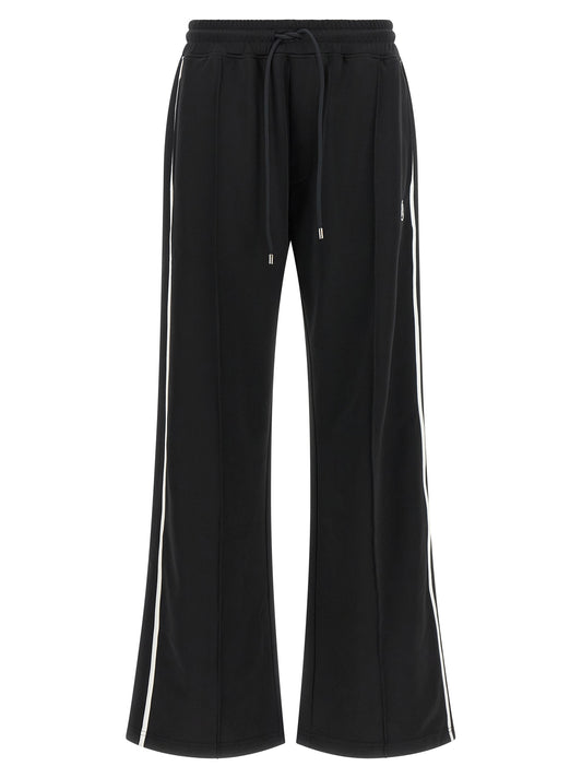 Pants by Amiri for women in cotton modacrylic metal & polyester black & white features an on trend silhouette with a and wide cut in an elegant long for a sophisticated look.
