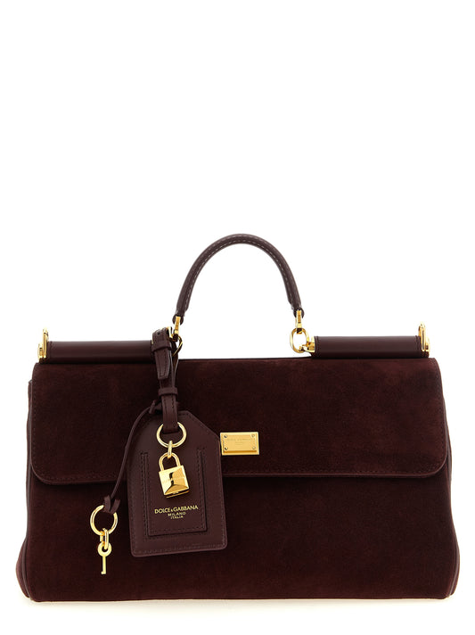 Handbag by Dolce & Gabbana for women in calf leather pvc & suede bordeaux & gold features a refined silhouette, showcasing a secure , organized , and versatile handle & adjustable-strap for a refined finish.