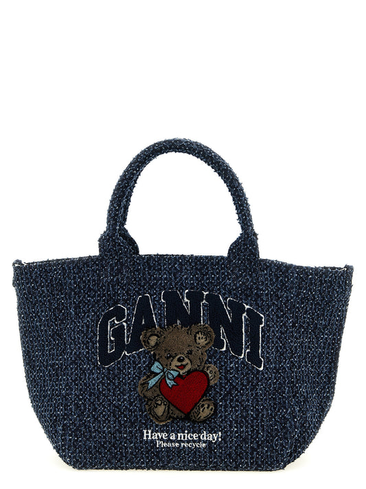 Small Tote Bag by Ganni for women in organic denim cotton & leather blue features a urban sophisticate Bear Organic Denim Cotton & Leather Small Tote Bag design with a secure , ample , and versatile shoulder-strap, adjustable-strap & handle for a urban sophisticate finish.
