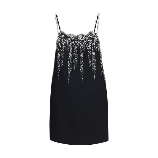 Dress by Valentino Garavani for women in virgin wool silk merino wool & crepe black, patterned & floral features a dramatic silhouette, showcasing an elegant and sleeveless that flows into a dramatic short mini.