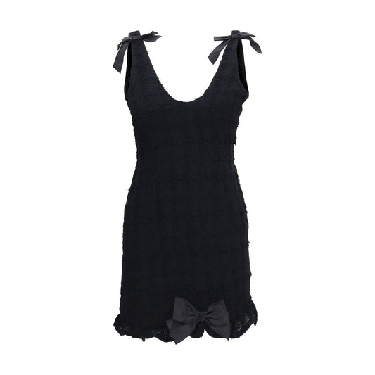 Dress by Alessandra Rich for women in cotton tweed linen & acrylic black, patterned & checked features an magnificent silhouette, artfully detailed with a magnificent and sleeveless that flows into an magnificent mini.