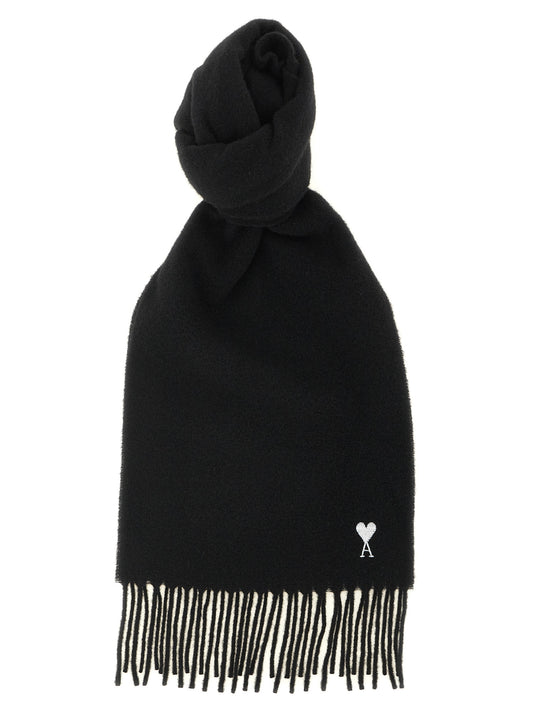 Scarf by Ami Paris for unisex in wool black showcases a on trend silhouette, artfully capturing the on trend essence of the Wool Wrap Fringes Scarf design with a sophisticated finish.