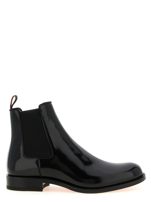 Ankle Chelsea Boots by Christian Louboutin for men in calf leather & polyester black, red & signature showcases a impeccable silhouette as Men's Calf Leather & Polyester Ankle Chelsea Boots, artfully defined by a impeccable and a impeccable .
