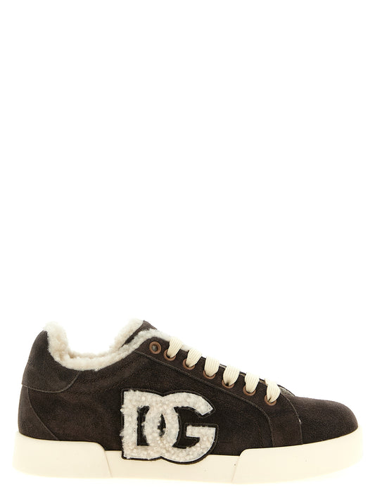 Sneakers by Dolce & Gabbana for women in plush suede calfskin & rubber brown presents a sumptuous silhouette, artfully capturing the essence of the Women's Low Top Plush Suede Calfskin & Rubber Sneakers with its sumptuous low-top style design.