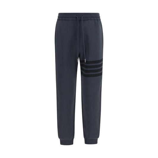 Pants by Thom Browne for men in cotton gray, silver, signature & striped features an understated silhouette, showcasing a sophisticated regular-fit and long with a refined for an understated, polished aesthetic.