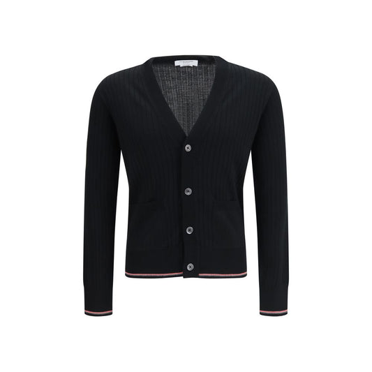 Cardigan by Thom Browne for men in polyamide & merino wool black & striped showcases a luxurious silhouette, meticulously detailed with a sophisticated v-neck neckline and for a refined finish.