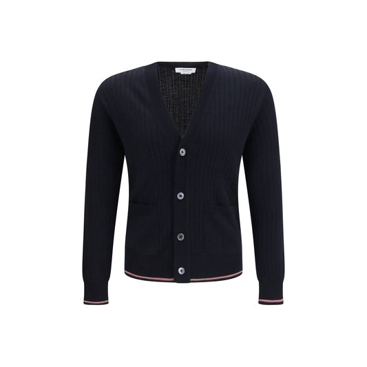 Cardigan by Thom Browne for men in polyamide & merino wool blue & striped features an crisp silhouette, showcasing a sophisticated v-neck neckline and detail for a truly crisp finish.