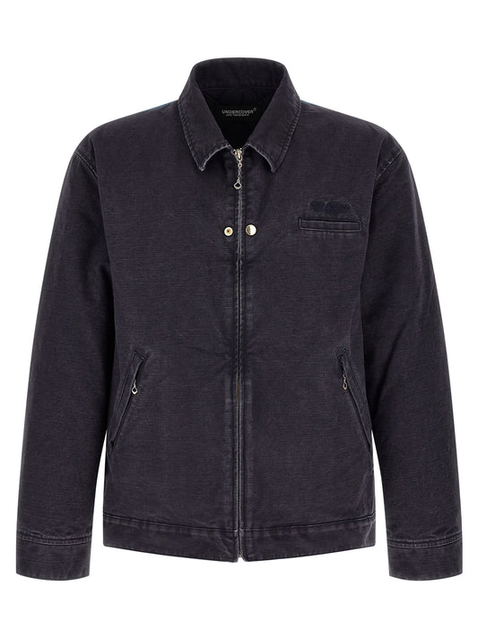 Overcoat by Undercover for men in cotton canvas blue & print features a contemporary silhouette showcasing a contemporary and refined pockets for a sophisticated finish.