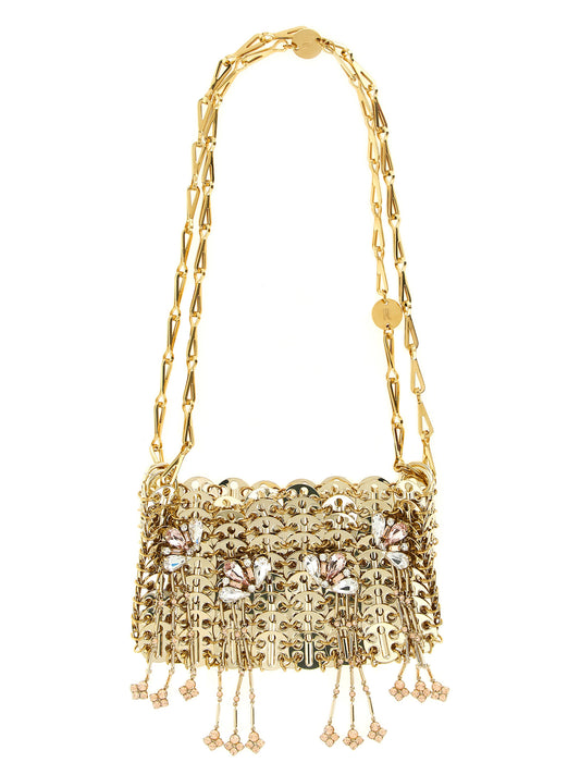 Evening Shoulder Bag by Paco Rabanne for women in crystal mesh & stainless steel gold & floral features a effortless chic silhouette with a secure , ample , and versatile shoulder-strap for a effortless chic finish.