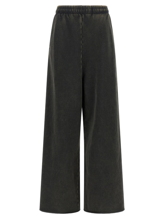 This Activewear by Entire Studios for women in cotton black features a dynamic silhouette, showcasing the signature style of the Women's Cotton Track Suit and functional .