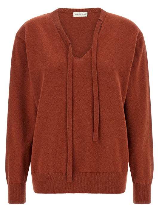 Cardigan by Dries Van Noten for women in plush cashmere red features an impeccable silhouette, showcasing a sophisticated v-neck neckline and detail for a truly impeccable finish.
