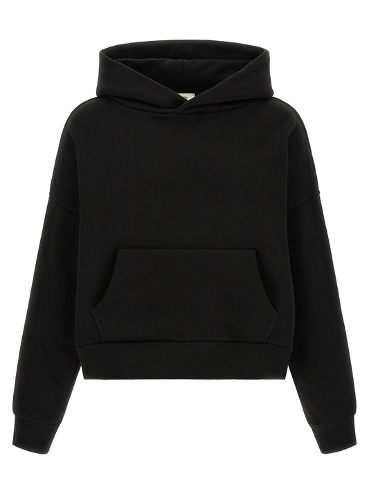 Sweatshirt Hoodie by Entire Studios for men in cotton black features an dramatic silhouette, showcasing a sophisticated hooded neckline and dramatic for a refined, modern aesthetic.