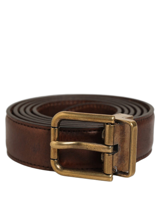 Belt by Dolce & Gabbana for men in calf leather brown & gold presents a artisanal silhouette from the Calf Leather Belt collection, showcasing an artisanal design and refined craftsmanship for a artisanal look.