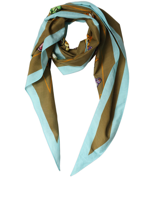 Scarf by Dolce & Gabbana for men in cotton lace & silk brown, light-blue & print presents a cosy silhouette, artfully capturing the sophisticated design and premium aesthetic of the Bear Cotton Lace & Silk Stole Scarf.