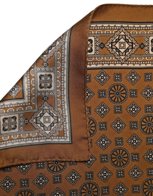 Scarf by Dolce & Gabbana for men in silk brown & patterned showcases a warm silhouette from the Silk Foulard Square Scarf collection, offering a warm drape that exudes sophisticated luxury.