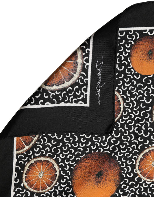 Scarf by Dolce & Gabbana for men in silk black, orange, white & patterned showcases a eye catching silhouette, artfully capturing the essence of the eye catching Silk Foulard Square Scarf design for a sophisticated look.