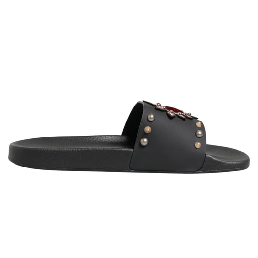 Flat Shoes by Dolce & Gabbana for men in calfskin leather black, gold & red features an effortless chic silhouette, showcasing the Heart Men's Calfskin Leather Flat Shoes design with an effortless chic flat and a for a effortless chic look.