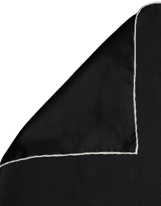 Scarf by Dolce & Gabbana for men in silk black presents a cosy silhouette, artfully capturing the sophisticated design and premium aesthetic of the Silk Foulard Square Scarf.