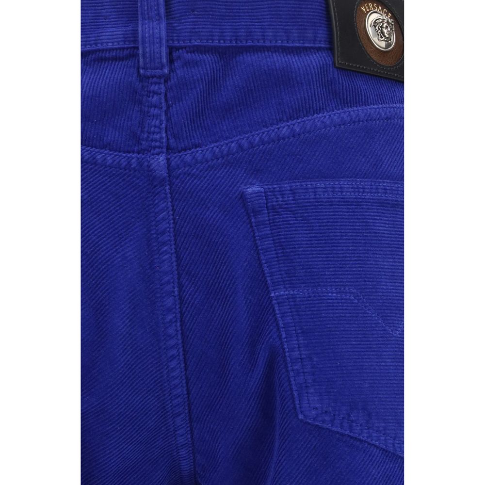 Jeans by Versace for men in denim cotton corduroy blue & signature presents a refined pantology silhouette, artfully defined by a refined pantology straight-leg & regular-fit, long, and a sophisticated .
