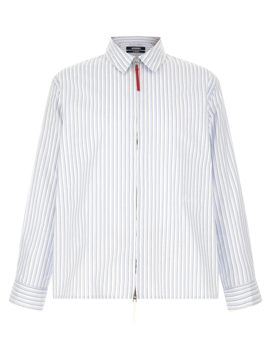 Shirt by Jacquemus for men in cotton light-blue, white, patterned & striped presents a discerning silhouette, showcasing a sophisticated square neckline and for a truly discerning finish.