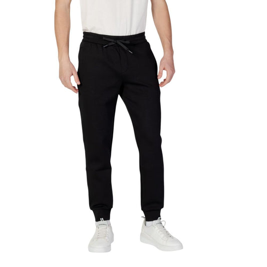 Joggers by Armani Exchange for men in stretch polyester cotton black presents a tailored silhouette, showcasing a tailored and long cut with a refined for a truly tailored aesthetic.