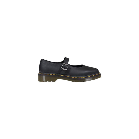 Platform Ankle Strap Pumps Heels by Dr. Martens for women in leather & rubber black features an effortlessly chic silhouette from the Virginia Women's Leather & Rubber Platform Ankle Strap Pumps Heels collection, showcasing a platform and effortlessly chic for a effortlessly chic look.